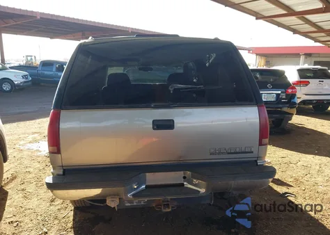 1999 Chevrolet Tahoe из США, поврежденный, VIN 3GNEC18R8XG231053